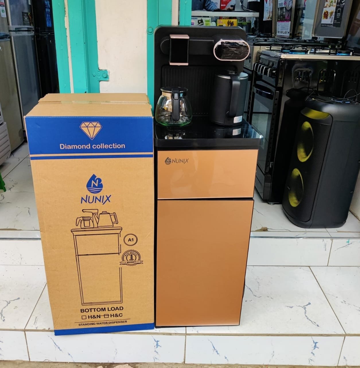 WhatsApp Image 2025-05-19 at 06.30.14(1) Nunix Z188C Bottom Load Water Dispenser – Hot, Normal & Cold